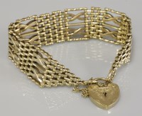 Lot 39 - A 9ct gold seven row crossover link gate bracelet