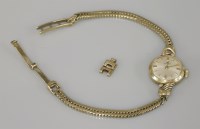 Lot 18 - A 9ct gold Hamilton ladies gold mechanical bracelet wristwatch