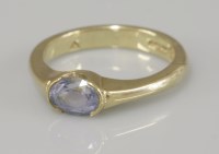 Lot 100 - A 9ct gold single stone oval mixed cut sapphire ring