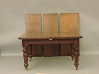 Lot 723 - A late Victorian walnut extending dining table