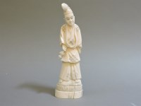 Lot 335 - A Japanese walrus ivory shinto priest