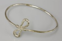 Lot 12 - A Tiffany & Co sterling silver crossover bangle