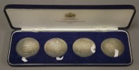 Lot 157 - A set of four sterling silver medallions