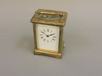 Lot 315 - A late 19th century French brass carriage clock