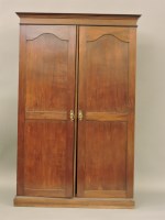 Lot 637 - A gentleman's mahogany two door wardrobe