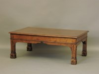 Lot 671 - A reproduction Gothic style oak rectangular coffee table