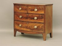 Lot 672 - A late Regency figured mahogany bow front chest