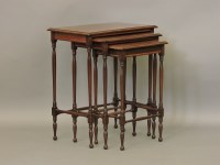 Lot 701 - An Edwardian mahogany and satinwood banded nest of tables