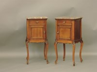 Lot 712 - A pair of late 19th century French walnut night tables