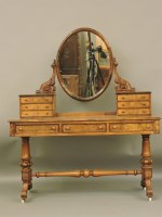 Lot 771 - A Victorian figured walnut dressing table