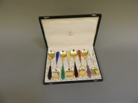 Lot 299 - A set of silver gilt and enamelled spoons