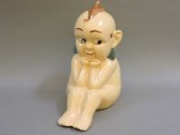 Lot 393 - A Kewpie advertising stoneware figure