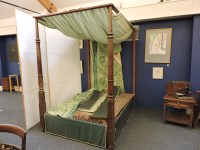 Lot 688 - A mahogany four poster bed