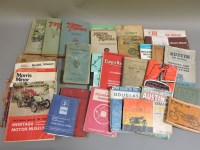 Lot 483 - A collection of motor car/bike manuals