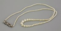 Lot 101 - A single row graduated pearl necklace