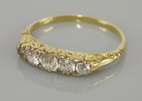 Lot 103 - A five stone diamond ring