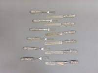 Lot 247 - A set of six ornate white metal Burmese knives and forks