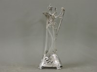 Lot 396 - A WMF style Art Nouveau claret jug and cover