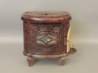 Lot 455 - A French plum coloured enamel wood burner