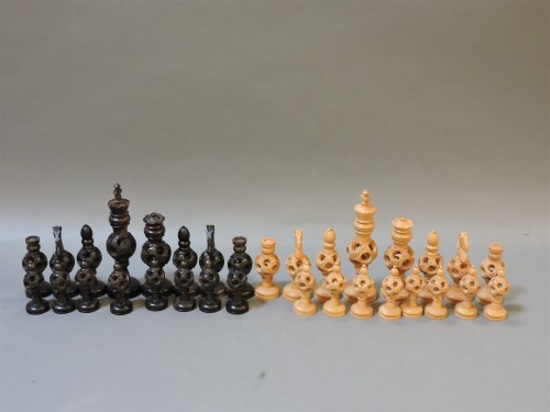 Lot 206 - A carved puzzle ball chess set