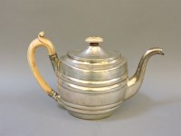 Lot 156 - A Georgian oval silver teapot