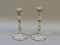 Lot 162 - A pair of 19th century silver plated candlesticks