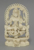 Lot 396 - A finely carved Indian ivory God