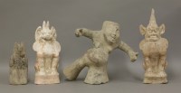 Lot 1 - Four earthenware Tomb Figures