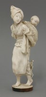 Lot 356 - A well carved ivory Okimono