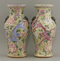 Lot 56 - A pair of intriguing famille rose Vases