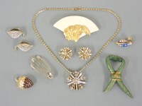 Lot 32 - A Trifari pendant/brooch and earring suite