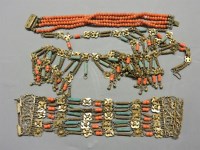 Lot 52 - A four row coral bead bracelet