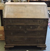 Lot 518 - An 18th century oak bureau