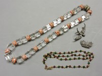 Lot 65 - An Art Deco glass cube and paste faux coral set rondelle bead necklace