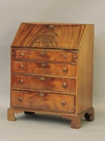 Lot 549 - A walnut bureau