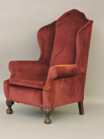 Lot 550 - A 1920s wing armchair