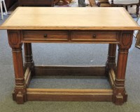 Lot 569 - A Victorian Gothic revival oak library table