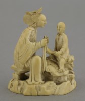 Lot 121 - A rare ivory group