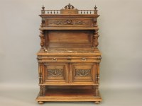 Lot 595 - A late 19th century Continental carved walnut buffet