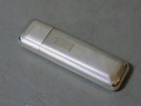 Lot 88A - A silver engine turned cigar case