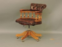 Lot 575 - A leatherette upholstered desk chair