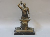 Lot 299 - A bronze figure of a blacksmith