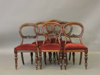 Lot 546 - A set of six Victorian mahogany balloon back dining chairs