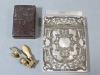 Lot 92 - A Victorian mother of pearl and silver pierced card case