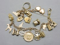 Lot 38 - A gold charm bracelet