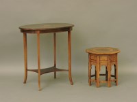 Lot 545 - An Edwardian strung and inlaid mahogany oval table