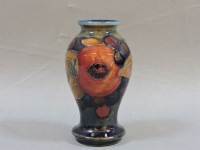 Lot 295 - A Moorcroft pomegranate art pottery vase