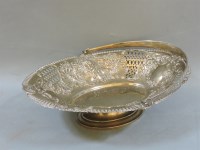 Lot 166 - A Victorian swing handle silver bread basket