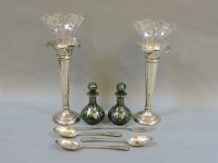 Lot 100 - A pair of silver vases