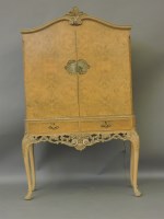 Lot 602 - A Queen Anne style satinwood cabinet